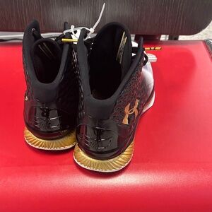 Under Armour Black and Gold High-Top Basketball Sneakers